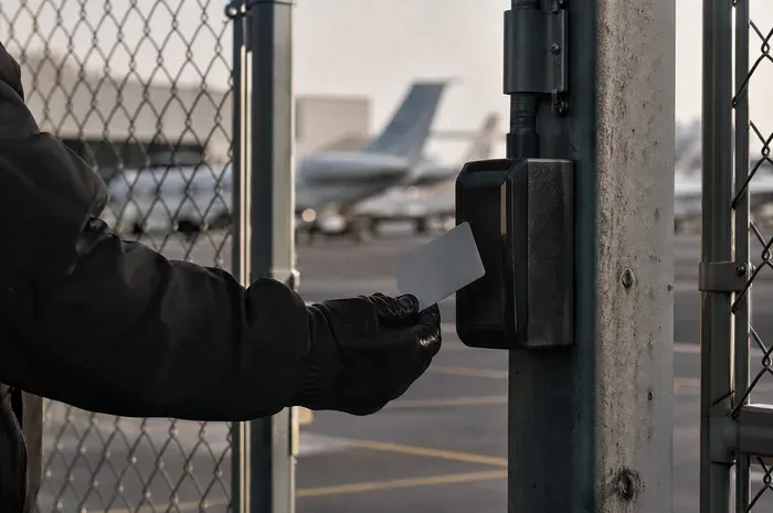 An access badge presented at an airfield gate reader