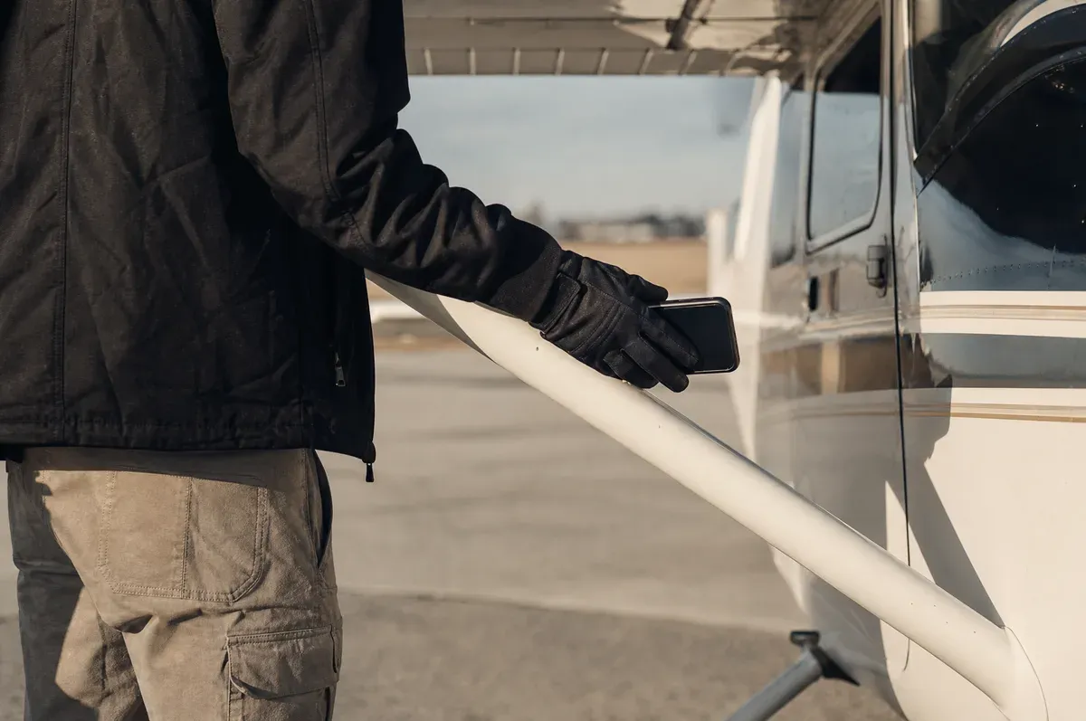 A scope call taken at the wing strut of a single-engine piston aircraft